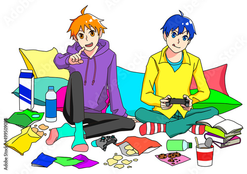  散らかった部屋でゲームをする二人の少年