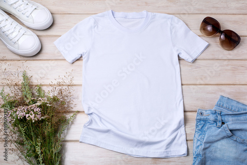 Fototapeta Womens white T-shirt mockup with wild grass and flowers