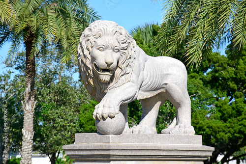 Historic stone lion statue at bridge of lions in St Augustine Florida photo