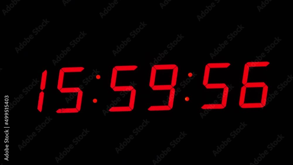 Digital timer on a black background. Light panel with red numbers Digital timer on a black background. Light panel with red numbers