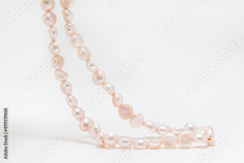 Pearl beads on a white background
