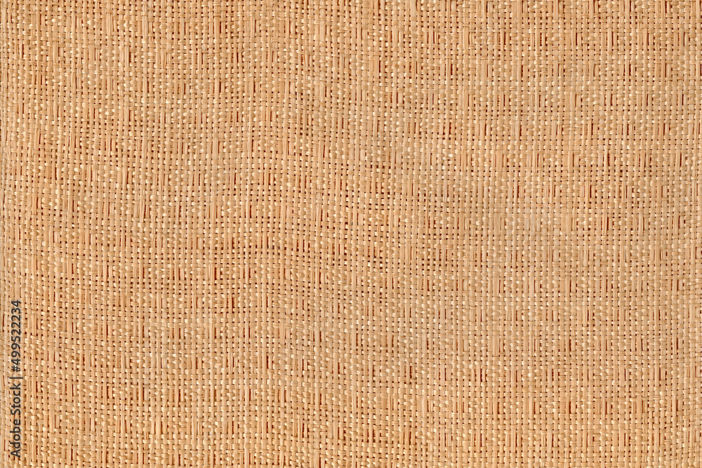Fototapeta premium Wicker Rattan background. Weave texture. Bamboo woven beige background.