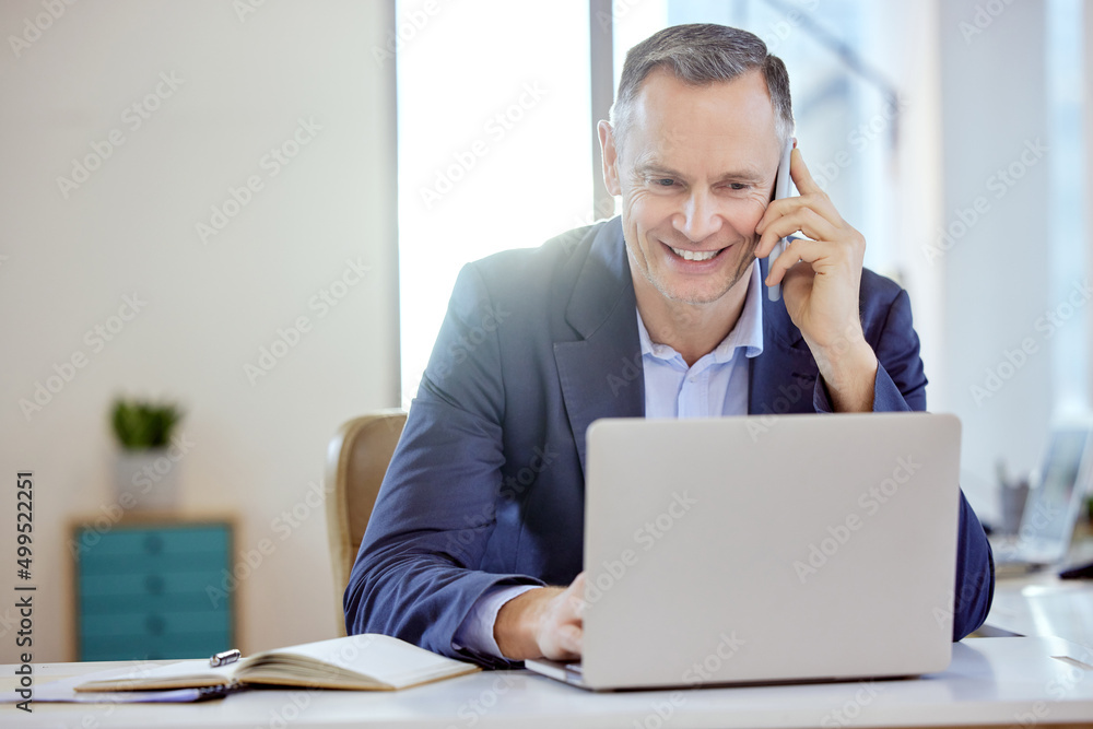 Hes got the right person for this job. Shot of a young businessman on a call in an office at work. Hes got the right person for this job. Shot of a young businessman on a call in an office at work.