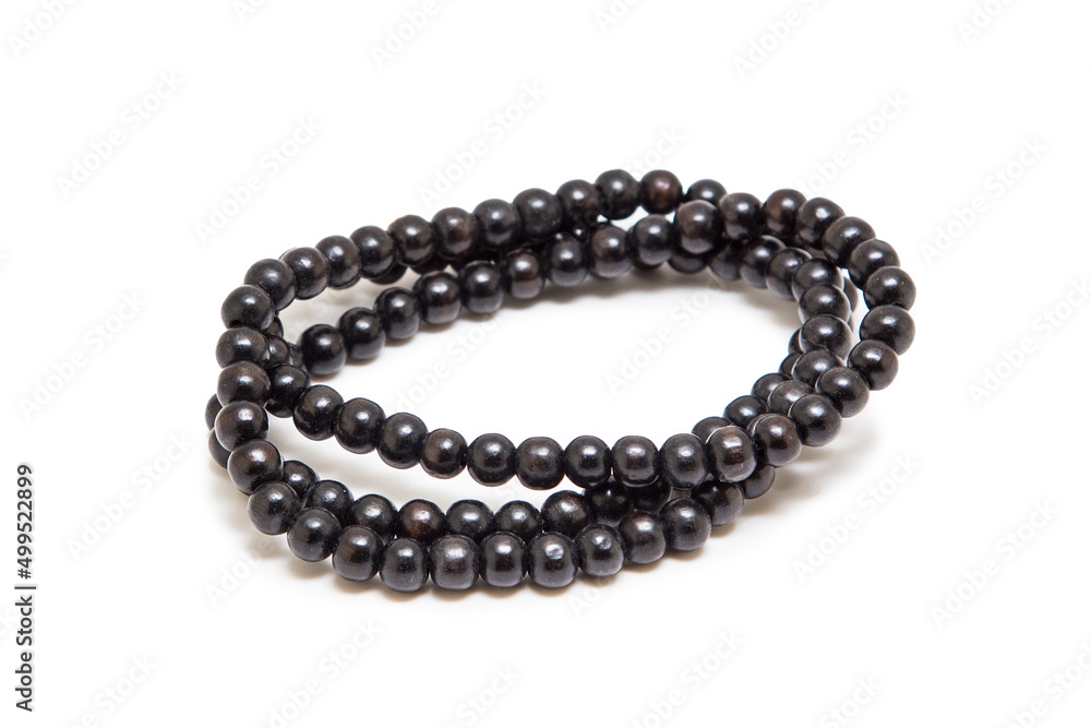 Obraz premium Bracelet made of stones on a white background