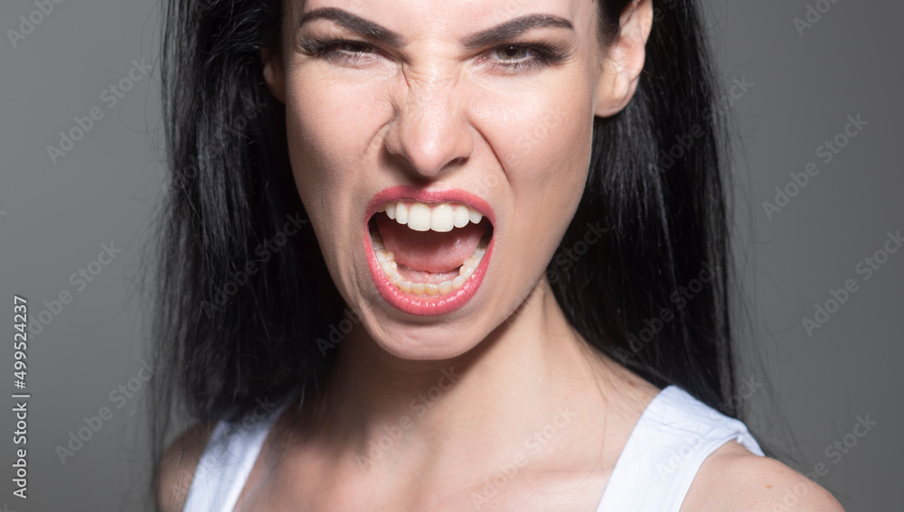 Angry woman, upset girl. Screaming, hate, rage. Pensive woman feeling furious mad and crazy stress. Angry woman, upset girl. Screaming, hate, rage. Pensive woman feeling furious mad and crazy stress.