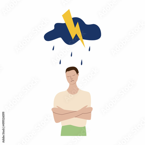 The sad guy hugged himself. A thundercloud is hanging over a person, it is raining, lightning is flashing. The concept of mental disorder, illness.