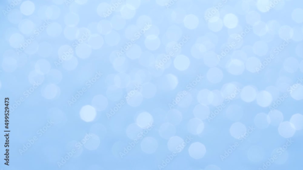 Bokeh blue christmas holiday abstract background, blurred motion of white lights Bokeh blue christmas holiday abstract background, blurred motion of white lights
