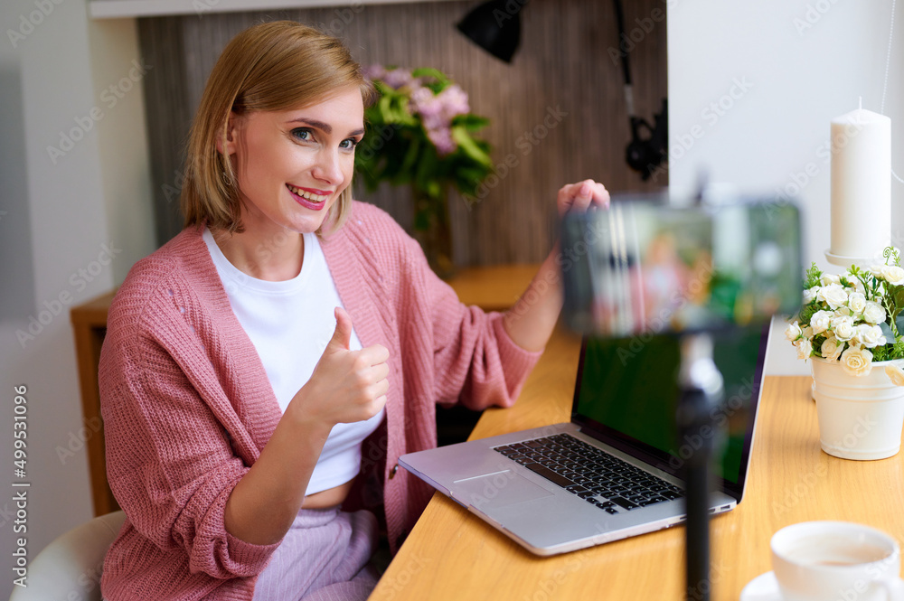 Female blogger recording vlog video live streaming and making a video. Business online influencer on social media concept. Online Selling. Online Shopping Female blogger recording vlog video live streaming and making a video. Business online influencer on social media concept. Online Selling. Online Shopping