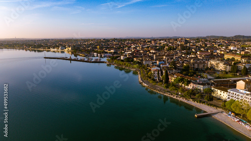 Aerial view of a lake town on a beautiful quiet morning  © xpabli
