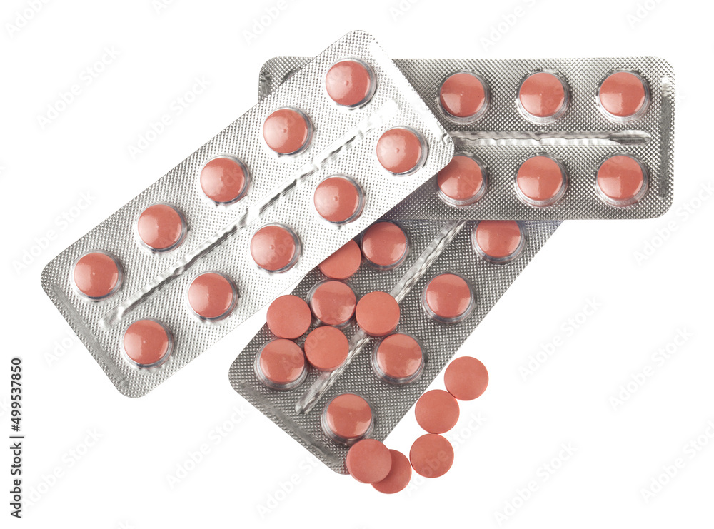 Pink pills isolated on white background. Pink pills isolated on white background.