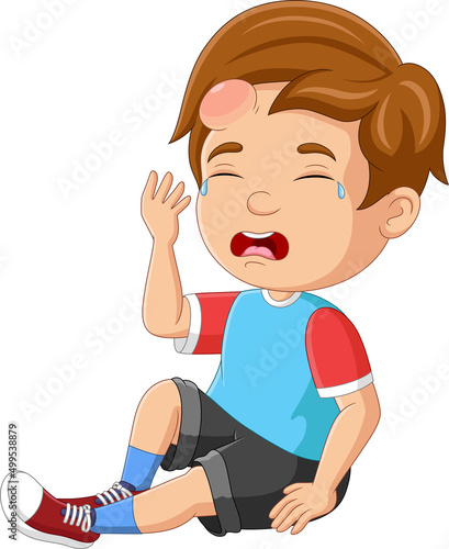 Little boy crying with a bump on his head