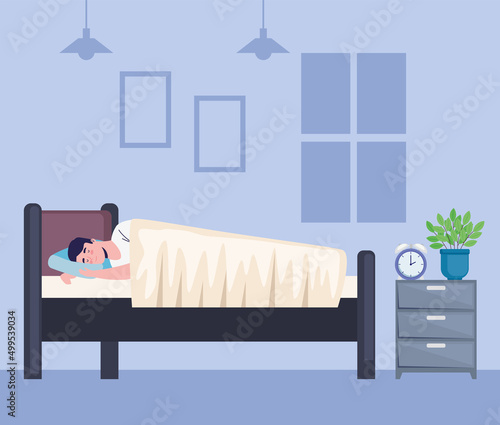 man sleeping in bedroom