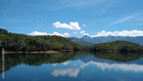 Neyyar dam reservoir, Thiruvananthapuram, Kerala, blue sky background, landscape view