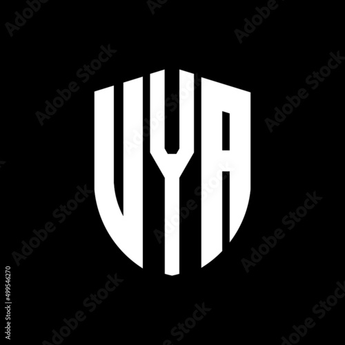 UYA letter logo design. UYA modern letter logo with black background. UYA creative  letter logo. simple and modern letter logo. vector logo modern alphabet font overlap style. Initial letters UYA  photo