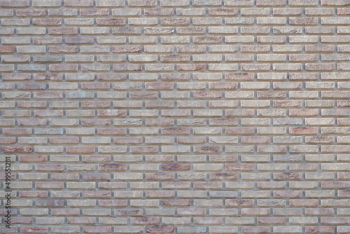 Background. Brick wall. Clinker clay brickwork. red brick wall background, wide panorama of masonry. Brown brick wall texture background