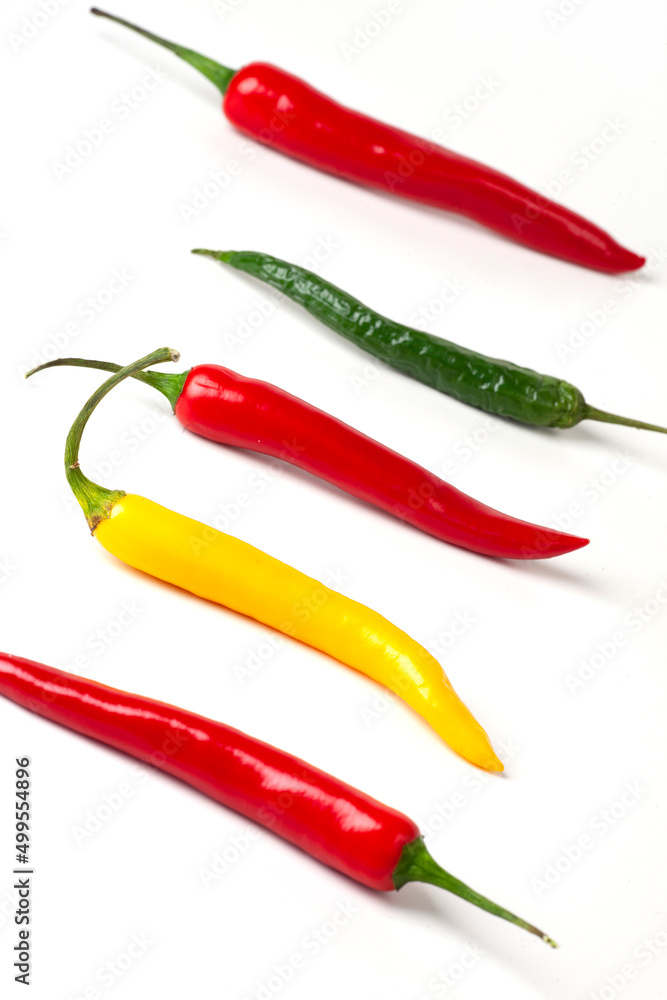 green, yellow, red hot chili peppers