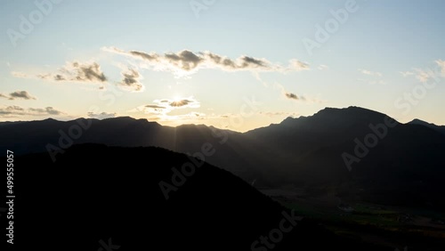 Time lapse scene of summer sunset in La Vall d'en Bas, La Garrotxa, Spain photo