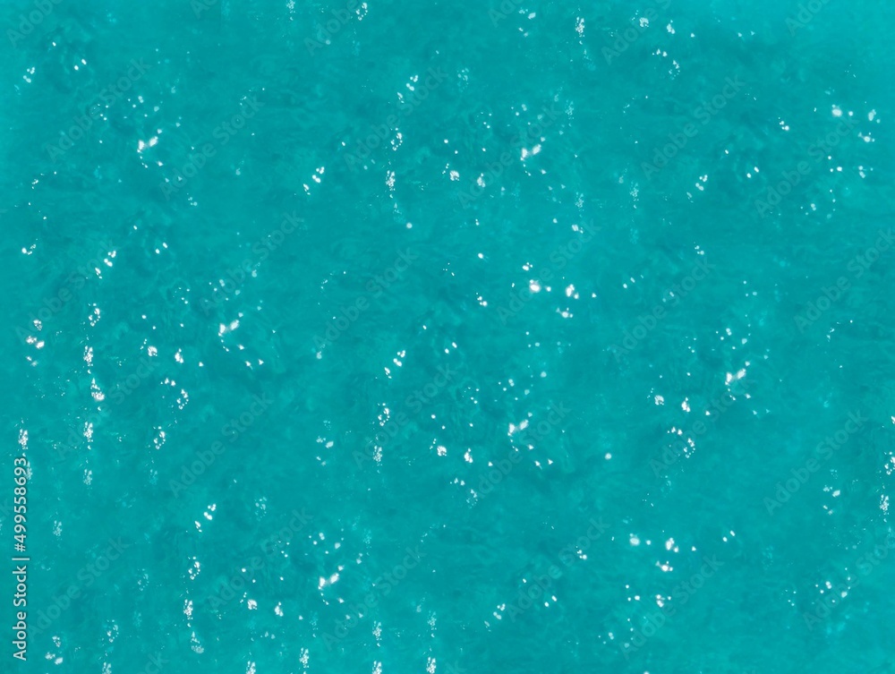 abstraction, ripples on turquoise water background,  space for text 