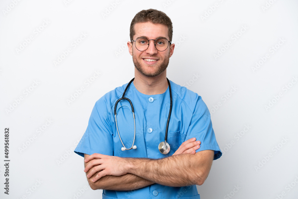 Young surgeon doctor caucasian man isolated on white background keeping the arms crossed in frontal position Young surgeon doctor caucasian man isolated on white background keeping the arms crossed in frontal position