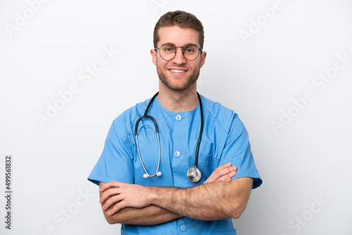 Young surgeon doctor caucasian man isolated on white background keeping the arms crossed in frontal position