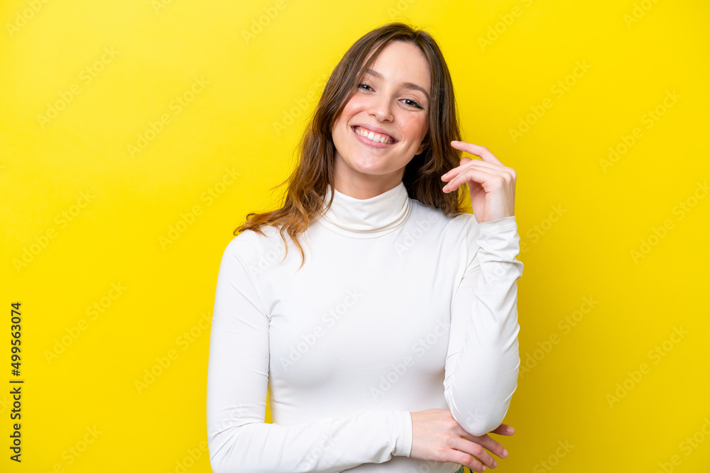 Young caucasian woman isolated on yellow background laughing Young caucasian woman isolated on yellow background laughing
