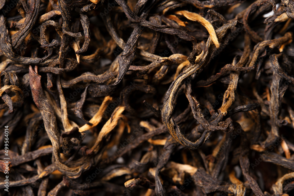 Dian Hong, black tea on white background. Top view. Close up. High resolution Dian Hong, black tea on white background. Top view. Close up. High resolution