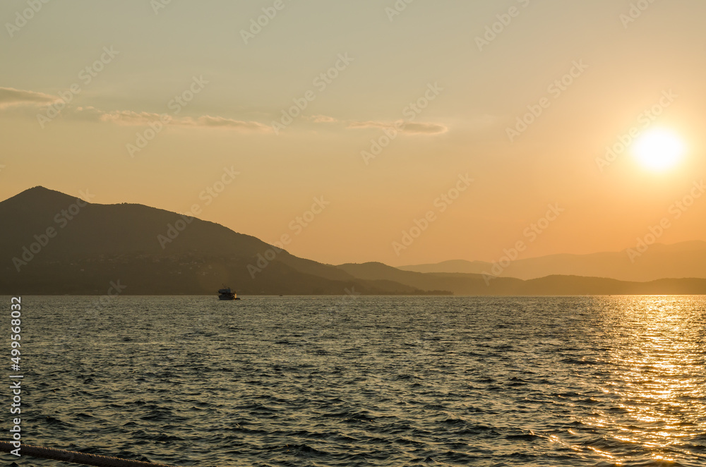 Fototapeta premium Evia island, Greece - July 01. 2020: Sunset on the island of Evia, Greece.
