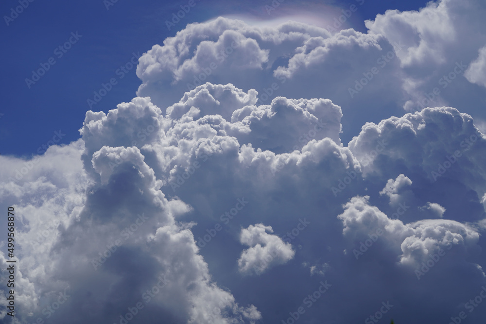 Blue sky with white clouds. Sky and clouds during the daytime in the summer. white fluffy clouds in the blue sky.