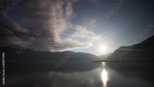 Starry sky and moonrise over Lake Teletskoye