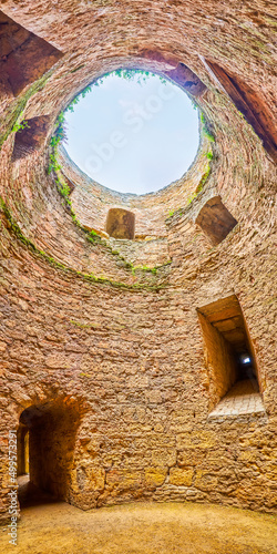Fotografiet Panorama of the spin view of the cloudy sky from the ruined tower of the Citadel