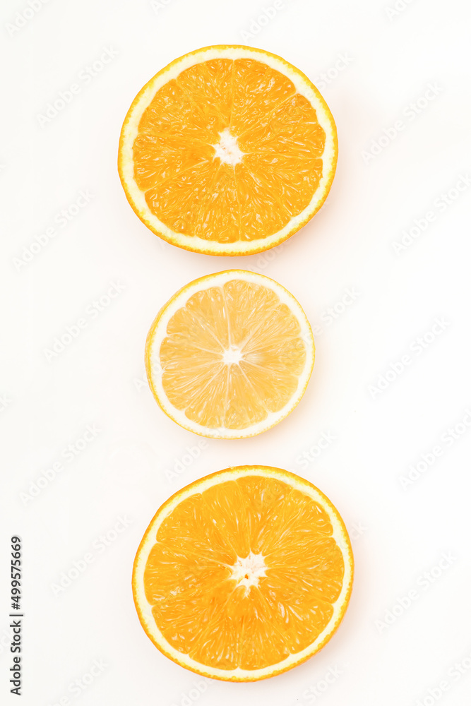 Flat lay of the three orange slices lying isolated on white background Flat lay of the three orange slices lying isolated on white background