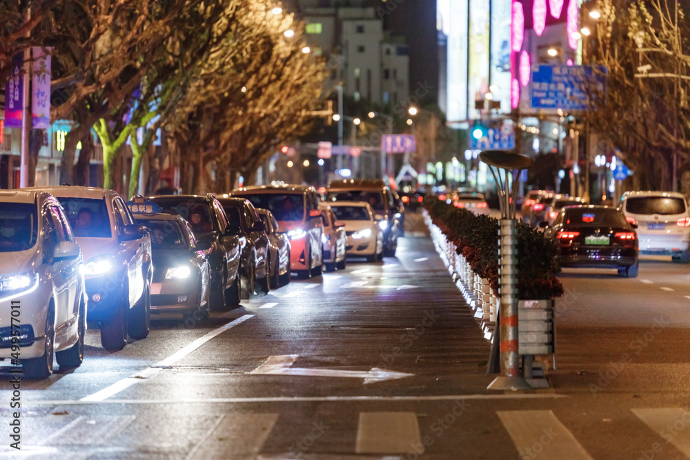 Fototapeta premium Cars at night in capital city