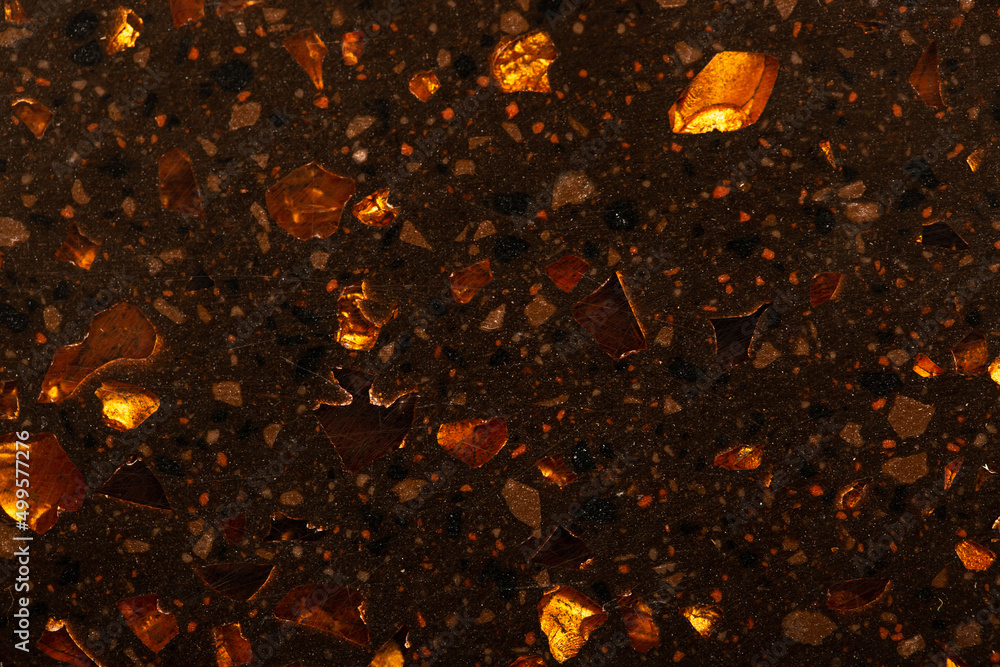 Background Stone wall, golden background with abstract stains of epoxy