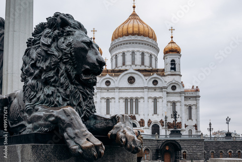 Lion statue is part of the monument to Alexander 2 on the territory of the Cathedral of Christ the Saviour