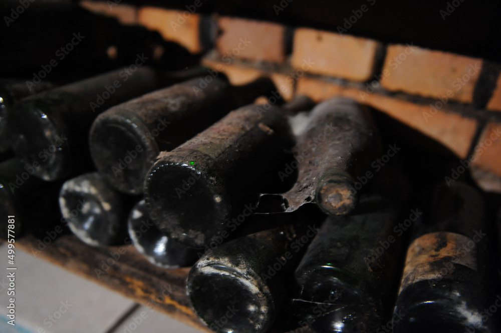 wine cellar. bottles of wine aged in special storage conditions. photo inside. wine cellar. bottles of wine aged in special storage conditions. photo inside.