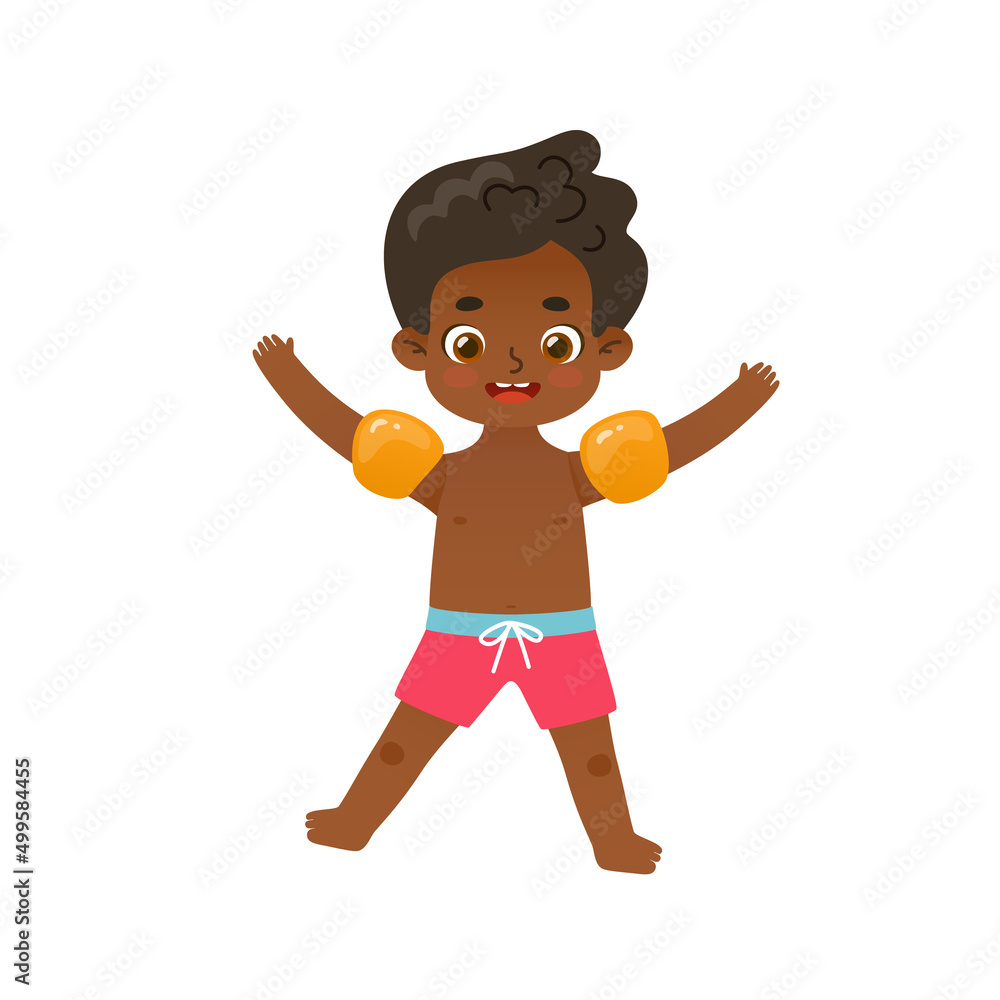 Happy african american boy jumping on the summer vacations. Adorable kid in inflatable armbands. Happy african american boy jumping on the summer vacations. Adorable kid in inflatable armbands.