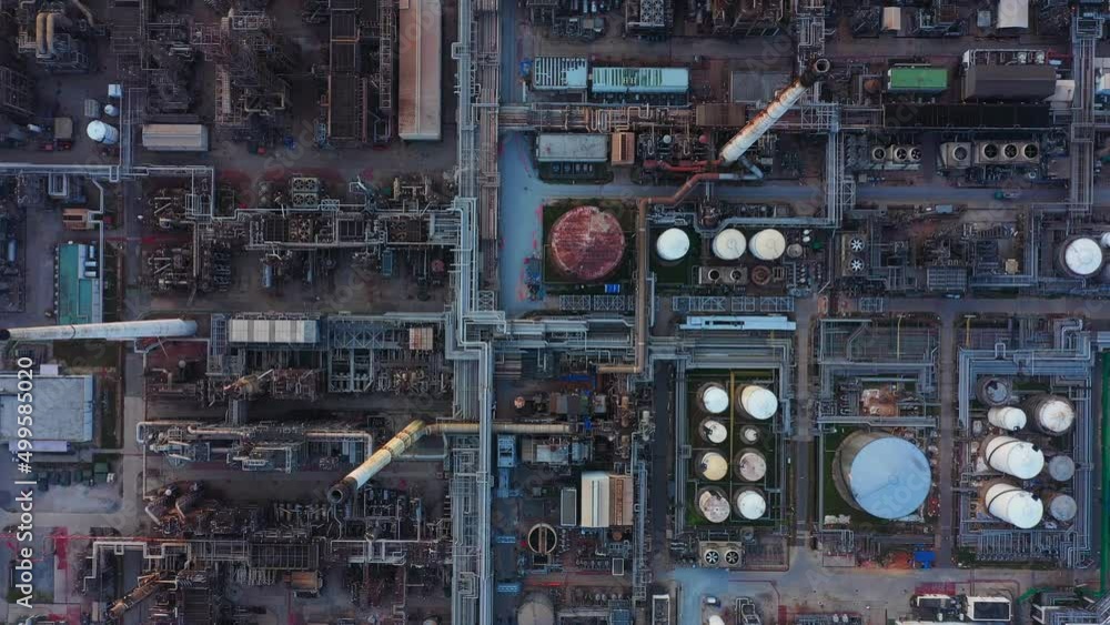 Aerial view of petrochemical oil refinery and sea in industrial engineering concept in Bangna district at night, Bangkok City, Thailand. Oil and gas tanks pipelines in industry. Modern metal factory.
Aerial view of petrochemical oil refinery and sea in industrial engineering concept in Bangna district at night, Bangkok City, Thailand. Oil and gas tanks pipelines in industry. Modern metal factory.