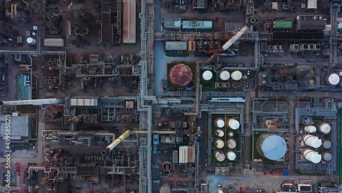 Wallpaper Mural Aerial view of petrochemical oil refinery and sea in industrial engineering concept in Bangna district at night, Bangkok City, Thailand. Oil and gas tanks pipelines in industry. Modern metal factory.
 Torontodigital.ca