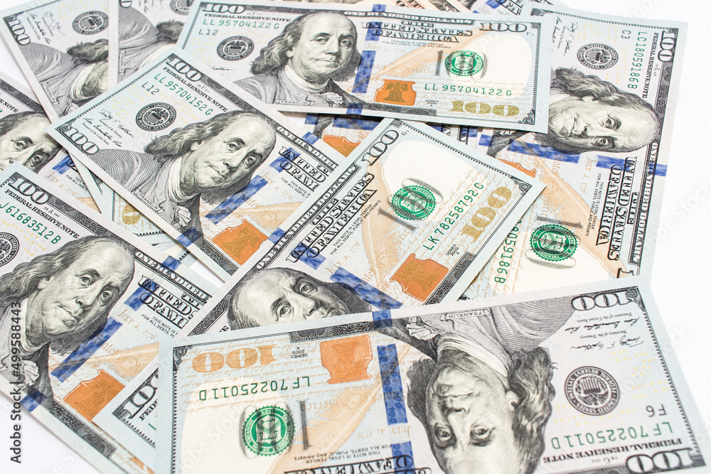 One hundred dollar paper bills of US money banknotes One hundred dollar paper bills of US money banknotes