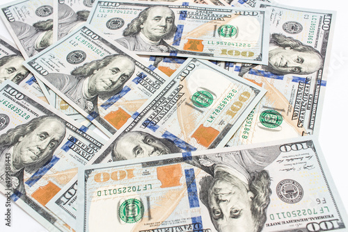 One hundred dollar paper bills of US money banknotes