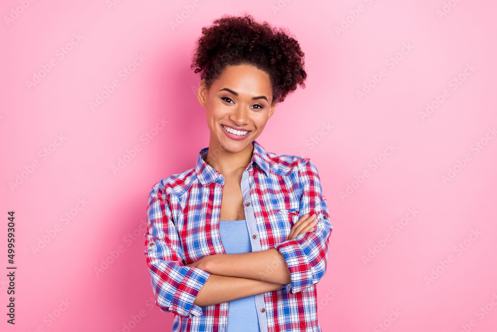 Photo of cute brunette wavy hairdo lady crossed palms wear plaid shirt isolated on pink color background Photo of cute brunette wavy hairdo lady crossed palms wear plaid shirt isolated on pink color background