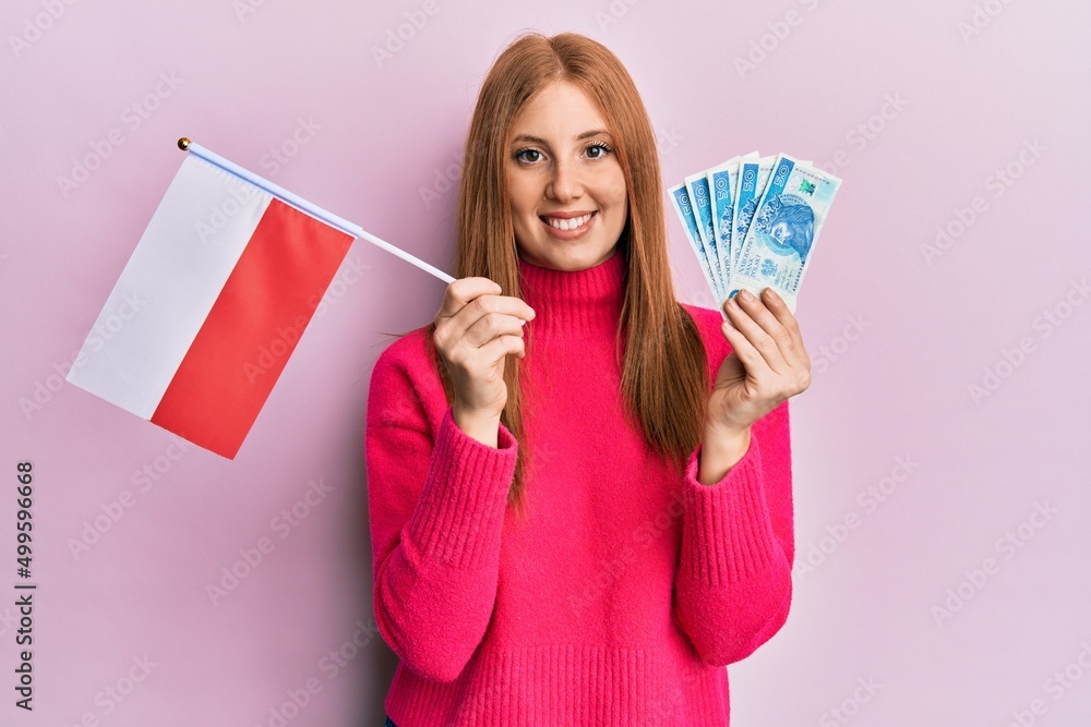 Young irish woman holding poland flag and zloty banknotes smiling with a happy and cool smile on face. showing teeth. Young irish woman holding poland flag and zloty banknotes smiling with a happy and cool smile on face. showing teeth.