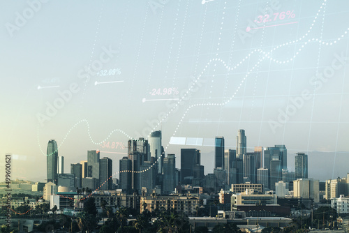 Double exposure of abstract creative statistics data hologram on Los Angeles office buildings background, analytics and forecasting concept