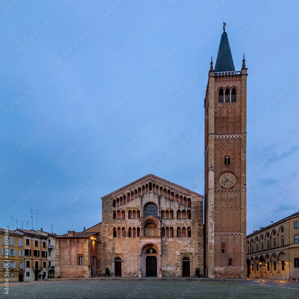 The cathedral square in Parma, Italy at dusk