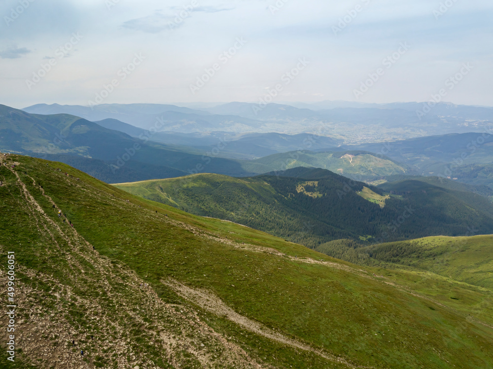 High mountains of the Ukrainian Carpathians in cloudy weather. Aerial drone view. High mountains of the Ukrainian Carpathians in cloudy weather. Aerial drone view.