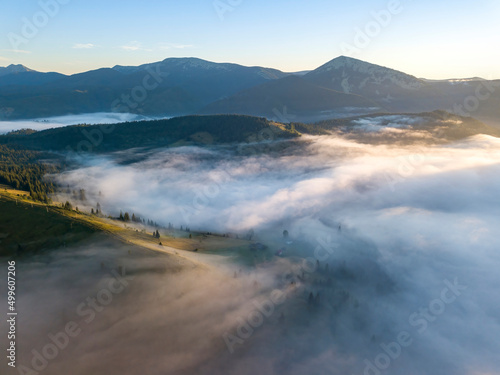 Morning fog in the Ukrainian Carpathians. Aerial drone view.