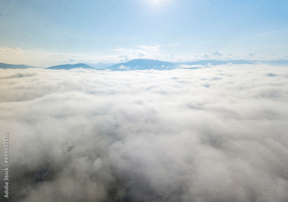 Fototapeta premium Morning fog in the Ukrainian Carpathians. Aerial drone view.