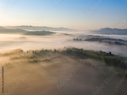 Morning fog in the Ukrainian Carpathians. Aerial drone view.