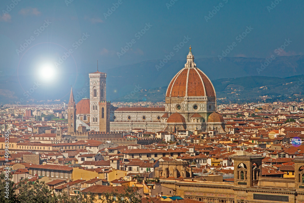 Italy - Tuscany - Florence - Panorama of city historical center with Cathedral of Saint Mary of the Flowers (Cattedrale di Santa Maria del Fiore) with sun