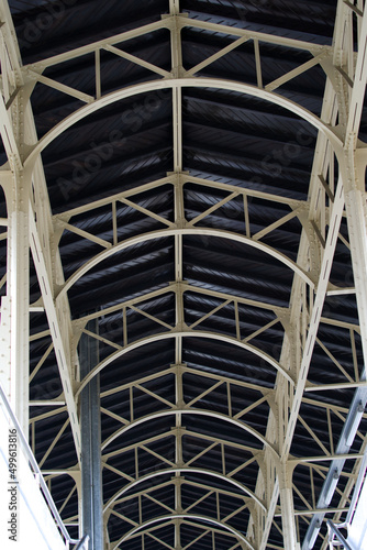 Roof of platform with arch construction at Vevey Railway station on a cloudy spring day. Photo taken April 4th, 2022, Vevey, Switzerland.